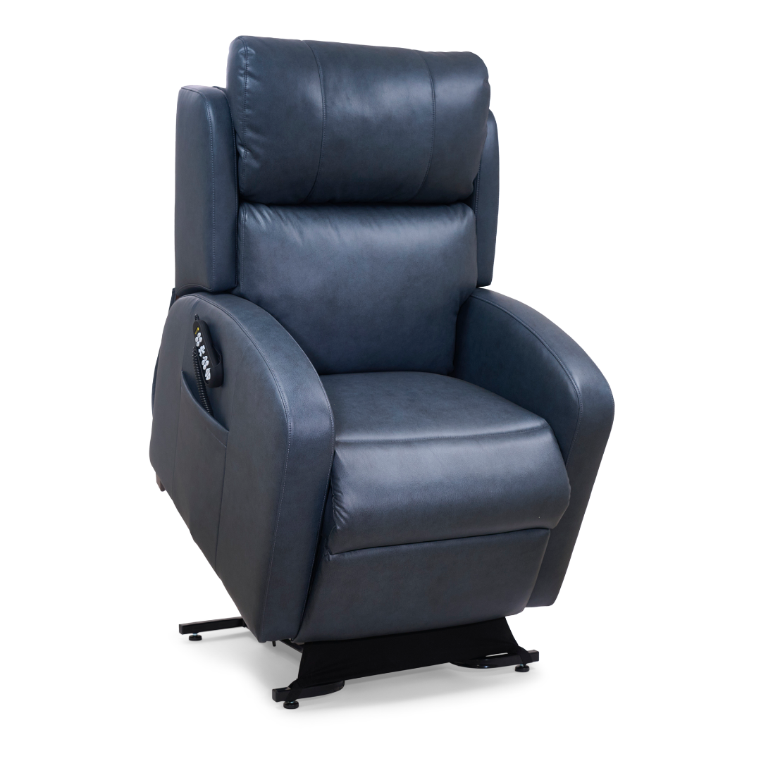 The Golden PR750 EZ Sleeper Slim Recliner with Lift Assist features dark blue leather, padded armrests and backrest, a side remote control pocket, a black metal base, and MaxiComfort 4-Zone support—shown against a white background.